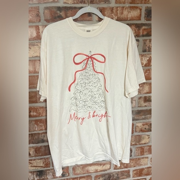 Comfort Colors Tops - Comfort Colors Cream Tee with Festive Bow Tree Design